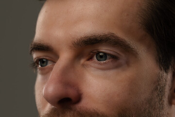 Fototapeta premium Portrait of a Man with Short Hair and Earrings
