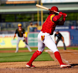 red and yellow baseball player