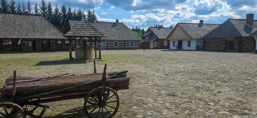 Wide angle shot of the recreated market square of a small Galician town in southeastern Poland at the Open-Air Museum in Sanok.