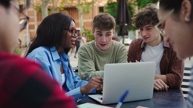 Happy university students team learning and working together, studying for exams at college campus - Powered by Adobe