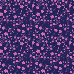Beautiful floral pattern in small abstract flowers. Small pink flowers. Dark Blue background. Ditsy print. Floral seamless background. The elegant the template for fashion prints. Stock pattern