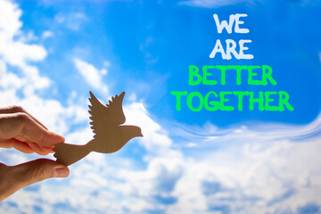 We are better together symbol. Concept words phrase We are better together on beautiful sky....