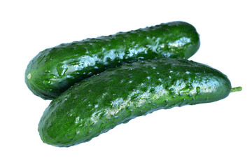 Two green cucumbers lie on a PNG background.