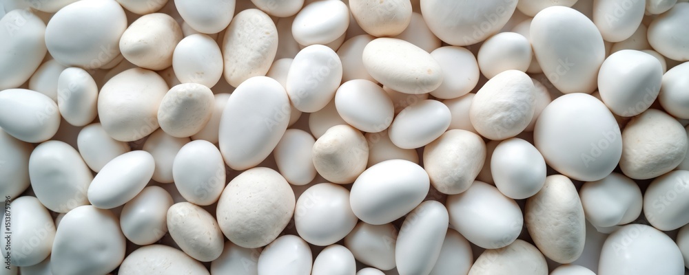 Poster pile of polished white stones different shapes sizes. natural arrangement of smooth rocks, create tr