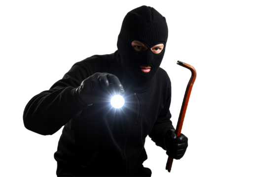A man wearing a black mask holds a flashlight in one hand and a hammer in the other, ready for action.