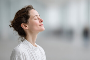 Fototapeta premium serene yoga instructor in light minimalist interior positioned to left of frame