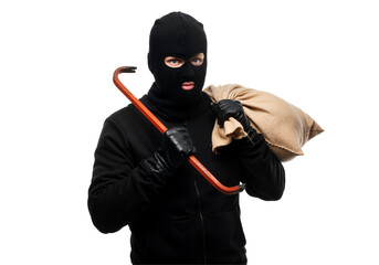 A man in a black hoodie and mask holds a cane, appearing serious as he stands with arms relaxed at his sides.