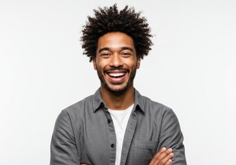 Happy young man with afro smiling broadly