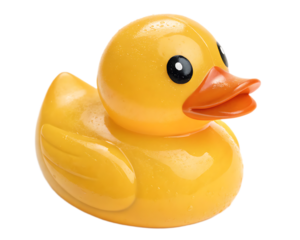 A yellow rubber duck with an orange beak and black eyes sits against a black background studio shot