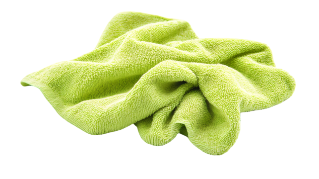 A crumpled light green terry cloth towel is displayed   in a studio shot isolated on transparent background