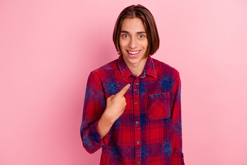Fototapeta premium You talking to me? Young man pointing to himself with question if he did something wrong