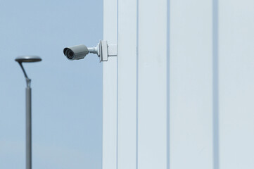 CCTV recorder installed on the exterior wall of the building