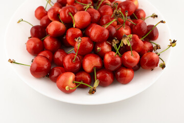 This delightful shot captures a generous pile of fresh, ripe cherries, evoking pure natural sweetness and seasonal joy. Perfect for food photography, healthy recipes, or farmers' market promotions