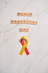 World Hepatitis Day. Hepatitis Awareness Ribbon.
