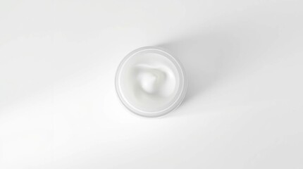 Cream jar, top-down view.  White background