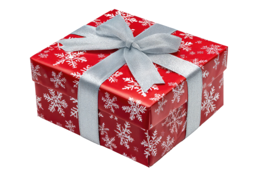 Christmas gift box with snowflake pattern and silver ribbon against a black background