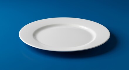 Simple White Plate on Blue Background - Clean, minimalist design. Empty plate symbolizes potential, simplicity, freshness, new beginnings, and culinary possibilities