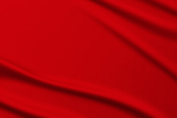 Abstract red background. Deep red color silk satin fabric with soft wavy folds