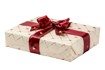 Wrapped gift with red satin ribbon and gold studs on a black background