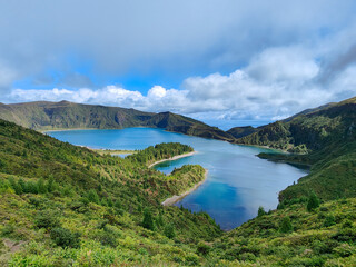 Picturesque view of Lagoa do Fogo crater lake with turquoise water. Tranquil mountain nature landscape. Sao Miguel Island, Azores, Portugal