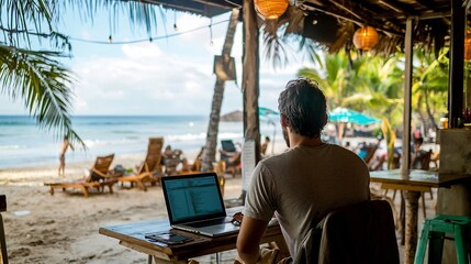Digital nomad working from a beachside caf laptop relaxed business environment