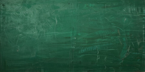 Abstract texture of green chalkboard background texture with copy space. Design concept for school education, dark wall backdrop , design template.	