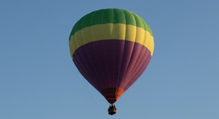 Fototapeta premium Chocolate gift box with ribbon and pieces of chocolate on a stone surface.