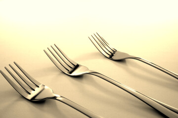 forks layered side by side closeup shot 
