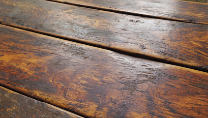 Close-up view of rustic wooden table surface showcasing rich textures, natural grain patterns, and warm tones, ideal for backgrounds or design elements in various projects