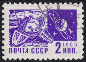 A stamp printed in the former USSR in 1966 features Space Probe Luna-9 and Moon