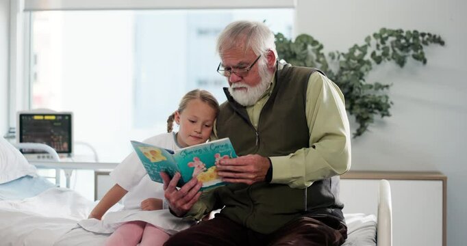 Hospital, kid and grandfather with book for reading, storytelling and visit with support for girl. Healthcare, patient and senior man with novel for fantasy, development or wellness with child in bed - Powered by Adobe