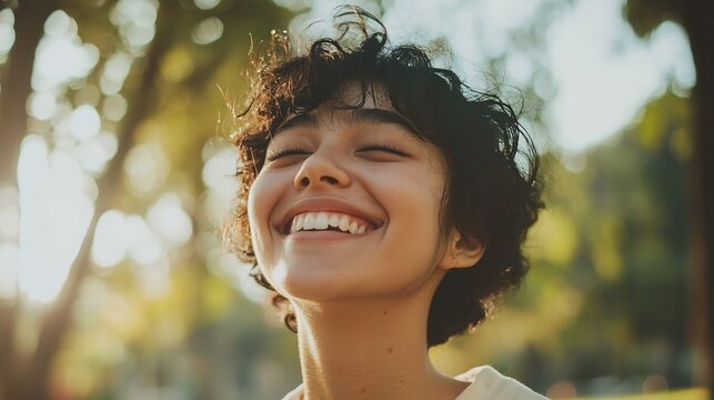 Person feeling good about themselves with a healthy smile and a positive outlook on life