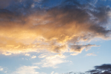 Beautiful bright sunset evening sky with dramatic clouds. Sunset background.