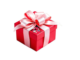 Obraz premium A red gift box tied with a light pink ribbon and bow on a black background with star confetti on top