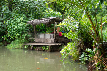 Fototapeta premium Riverside fruit market stall Fa'aroa River estuary, Raiatea, French Polynesia, South Pacific