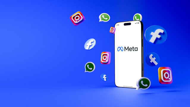 Meta on mobile phone screen. iPhone showing Meta logotype and other brands like WhatsApp, Facebook and Instagram. Ads concept son smartphone.