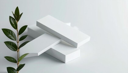 Green Branch with White Geometric Forms