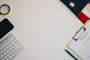 American flag flat lay. Modern Business Workspace with American Flag and Office Supplies for Creative and Professional Settings