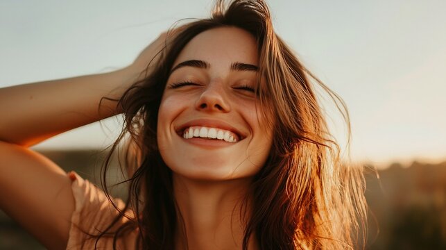 Woman feeling confident and beautiful with a radiant smile that reflects her inner joy