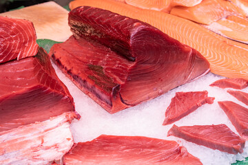 Freshly caught tuna at the market. Fish fillet, healthy food. Source of omega-3 acids. Beautiful...