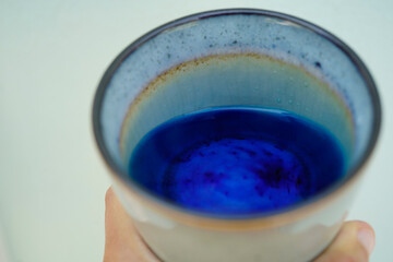image showing a  cup filled with methylene blue and water