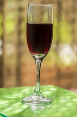 Glass of red wine with blurred background