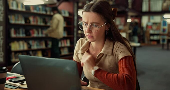 Woman, library and student with laptop, tired and frustrated with deadline for project. Pc, scholarship and person with online test, university or stress with fatigue, knowledge and quiz with mistake