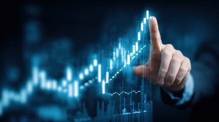 A business professional points at a rising graph, symbolizing financial growth and success in the corporate world.