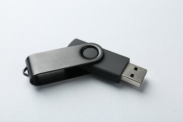 One flash drive on white background, closeup