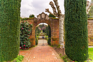 Beautiful arch with iron gate, Filoli Historic House and Garden.