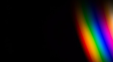 Abstract Light Spectrum with a Rainbow Effect on Black Background
