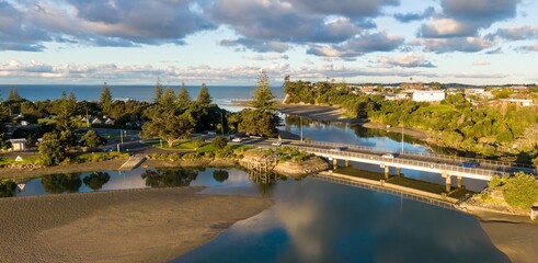Aerial view of Orewa, Auckland, New Zealand, showcasing the estuary where the Orewa River meets the...