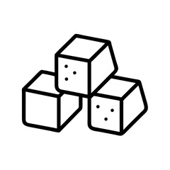 Three sugar cubes arranged in a stack on a plain background  