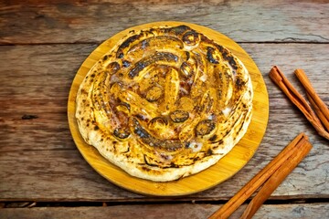 Traditional Brazilian sweet banana pizza with cinnamon and condensed milk. The best pizza in the world